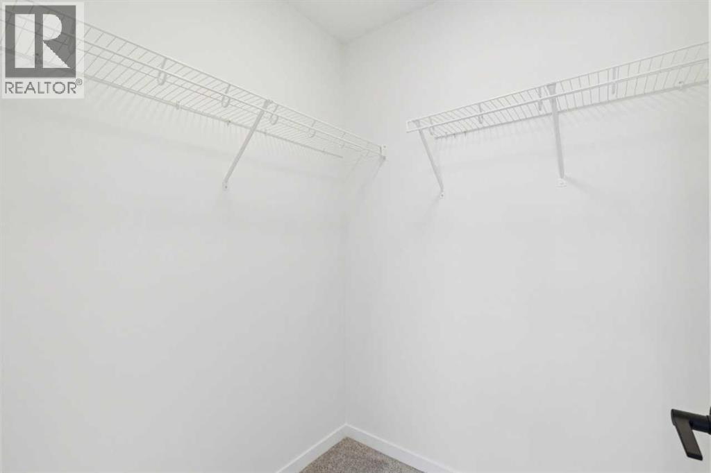 90 Bluerock Hill SW, Calgary, Alberta  T2Y 0V6 - Photo 22 - A2284600