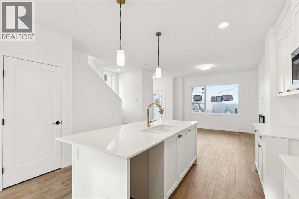 90 Bluerock Hill SW, Calgary, Alberta  T2Y 0V6 - Photo 6 - A2284600