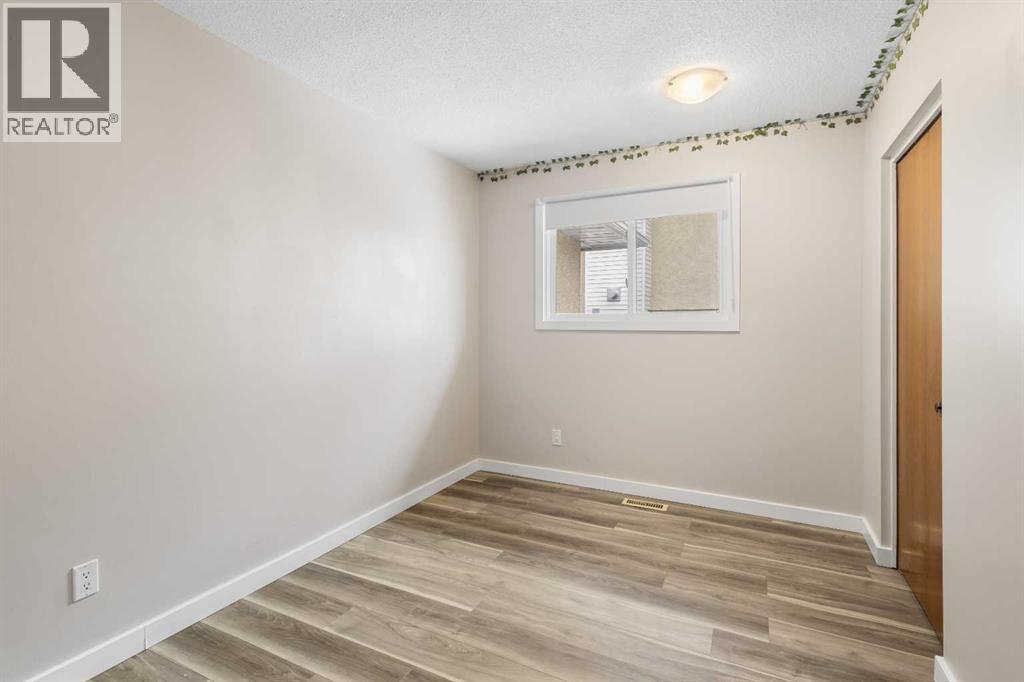 7604 Hunterfield Road NW, Calgary, Alberta  T2K 4L3 - Photo 11 - A2294509