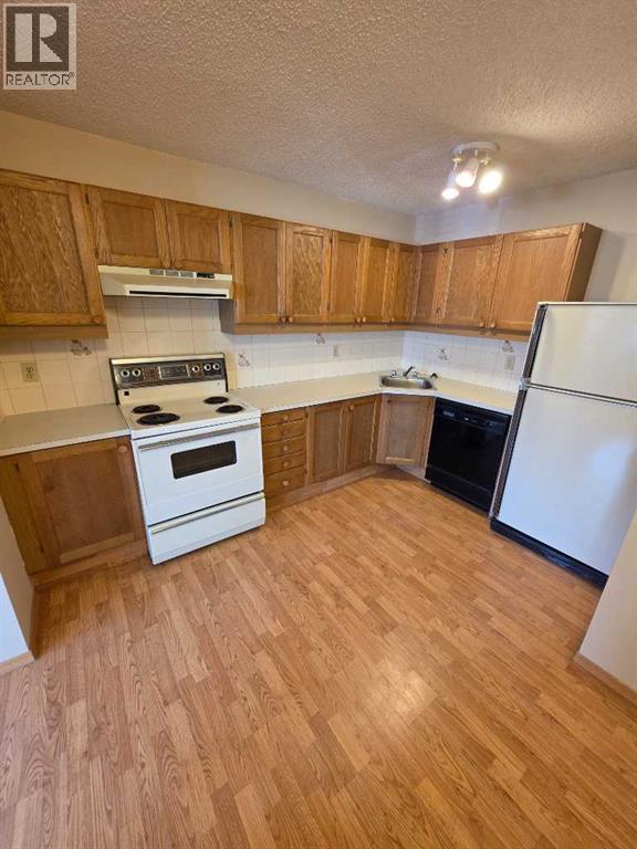 102, 5015 51 Street, Taber, Alberta  T1G 1P4 - Photo 4 - A2295420