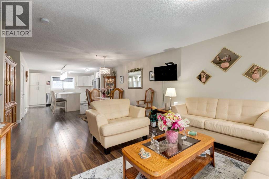 119 Baysprings Terrace Sw, Airdrie, Alberta  T4B 4A8 - Photo 3 - A2296564