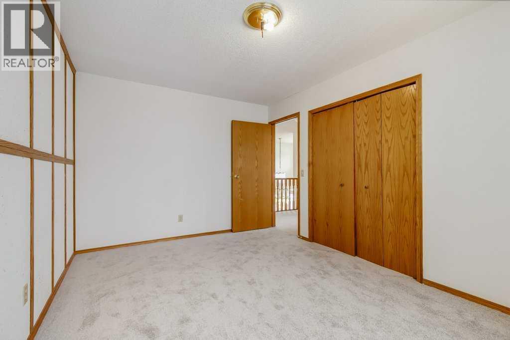 106 Sienna Hills Drive SW, Calgary, Alberta  T3H 2C8 - Photo 25 - A2282460