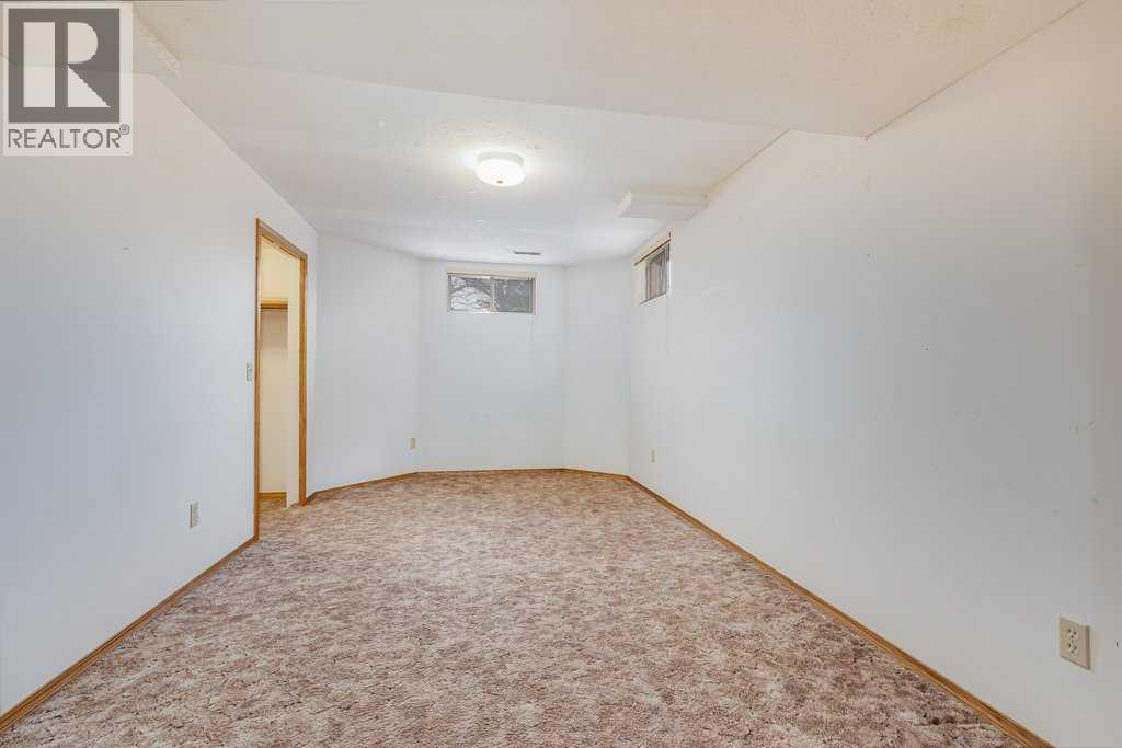 106 Sienna Hills Drive SW, Calgary, Alberta  T3H 2C8 - Photo 41 - A2282460