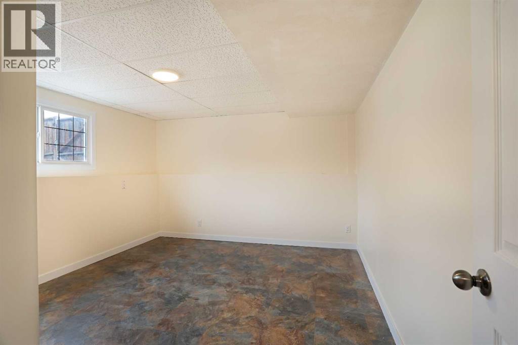 63 Ash Street W, Brooks, Alberta  T1R 0A6 - Photo 40 - A2295730