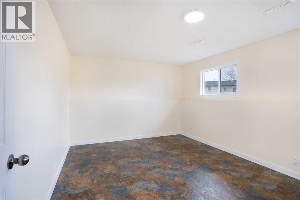 63 Ash Street W, Brooks, Alberta  T1R 0A6 - Photo 38 - A2295730