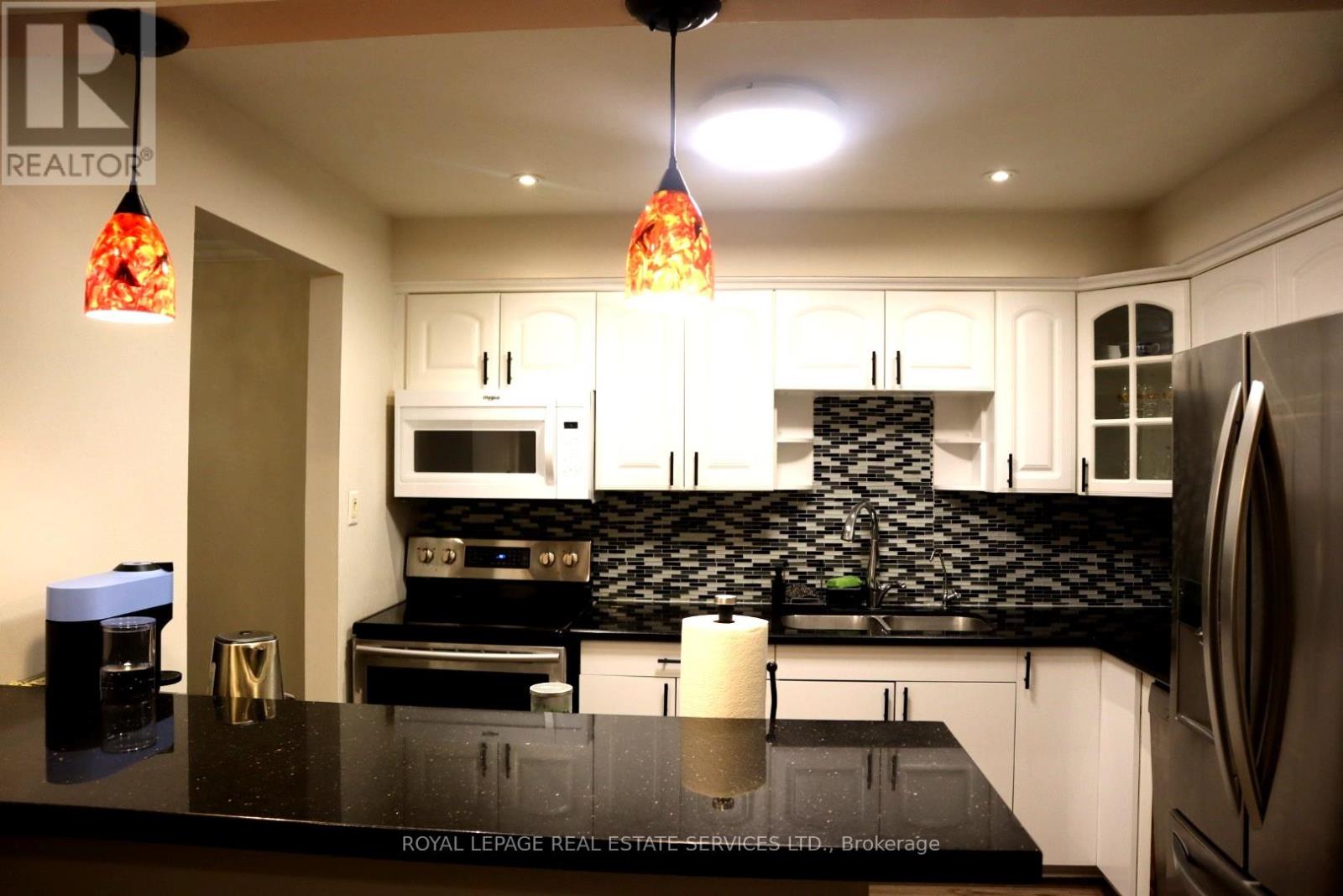 43 - 6449 Glen Erin Drive, Mississauga, Ontario  L5N 2T2 - Photo 4 - W12937780