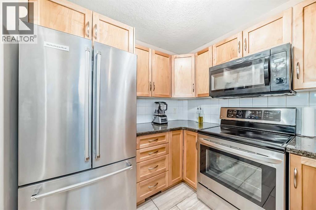 103, 26 Glamis Green Sw, Calgary, Alberta  T3E 6V1 - Photo 9 - A2295598