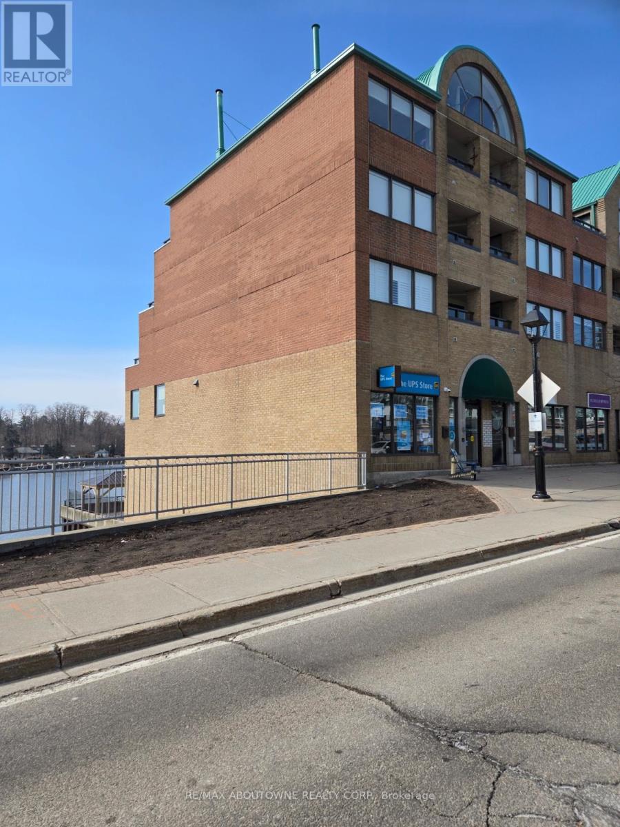 319 - 100 Bronte Road, Oakville, Ontario  L6L 6L5 - Photo 3 - W12938046