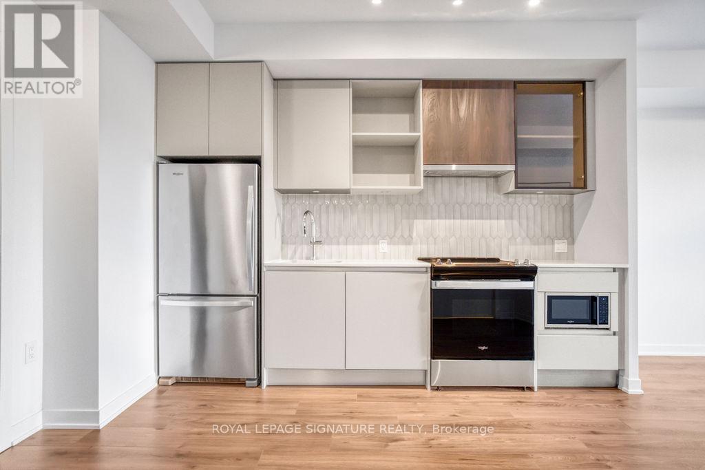 402 - 395 Dundas Street W, Oakville, Ontario  L6M 5R8 - Photo 12 - W12938304