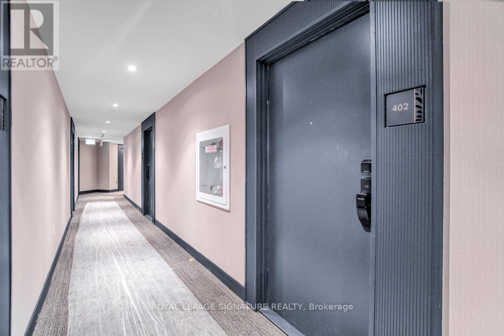 402 - 395 Dundas Street W, Oakville, Ontario  L6M 5R8 - Photo 5 - W12938304