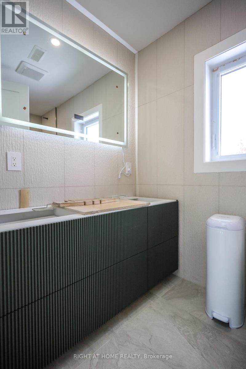 11 Sparta Road, Toronto, Ontario  M6L 2M4 - Photo 25 - W12938398