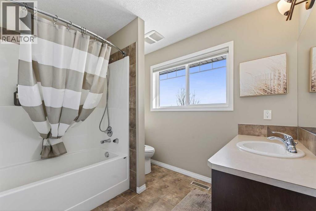 183 Reunion Grove Nw, Airdrie, Alberta  T4B 0Z3 - Photo 26 - A2297729