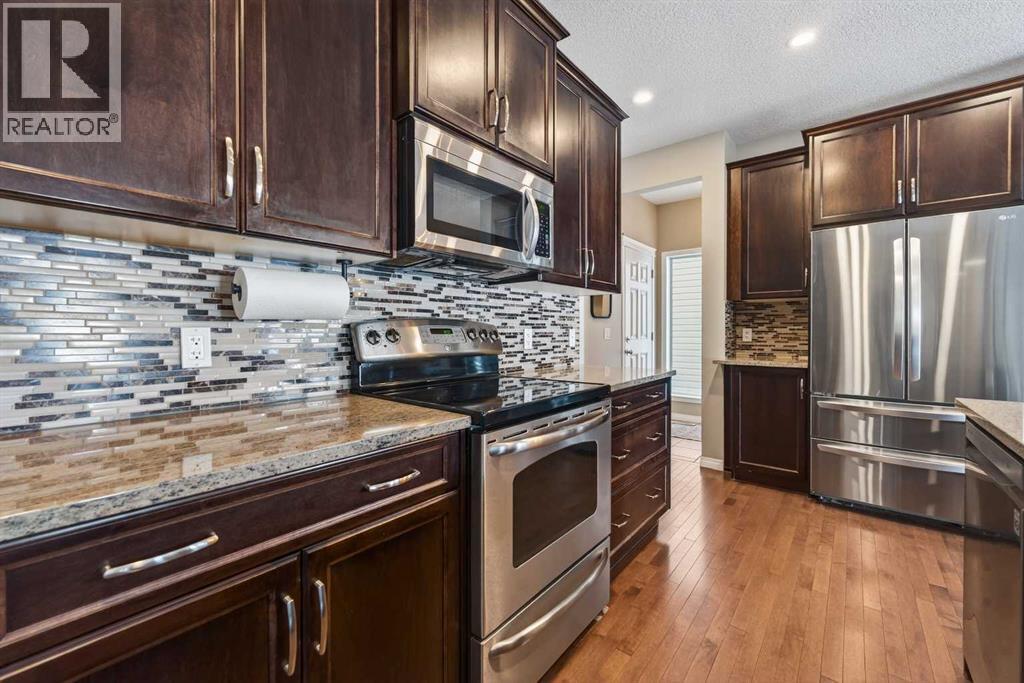 183 Reunion Grove Nw, Airdrie, Alberta  T4B 0Z3 - Photo 7 - A2297729