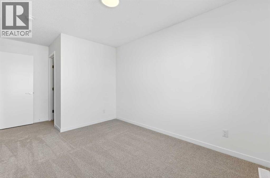 89 Corner Glen Avenue NE, Calgary, Alberta  T3N 2L7 - Photo 7 - A2253063