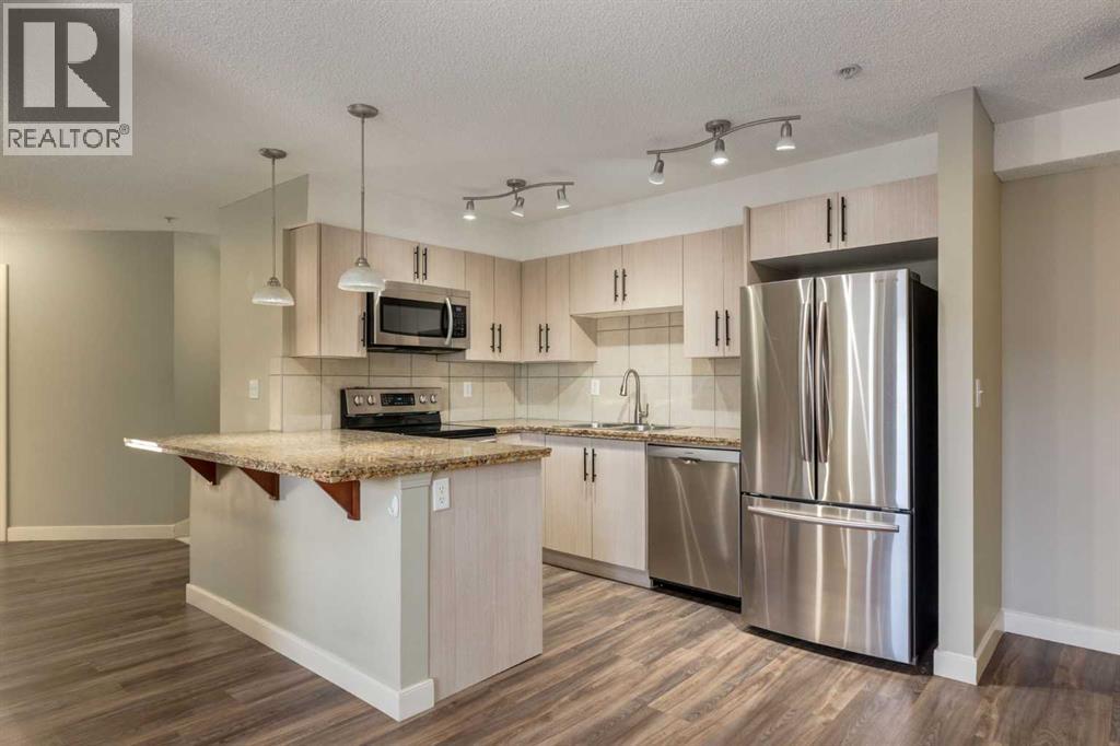 301, 108 Country Village Circle NE, Calgary, Alberta  T3K 0E3 - Photo 1 - A2278141