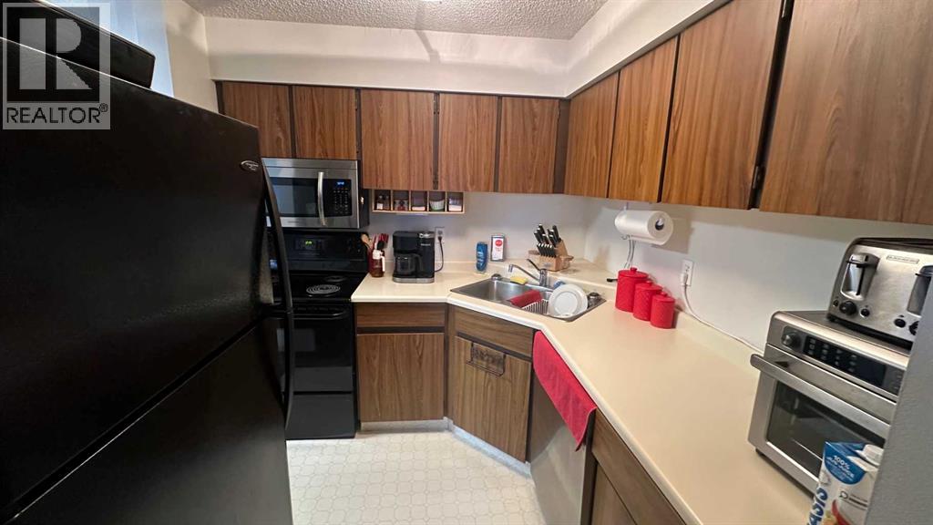 308, 8403 Fairmount Drive SE, Calgary, Alberta  T2X 3M5 - Photo 6 - A2296492