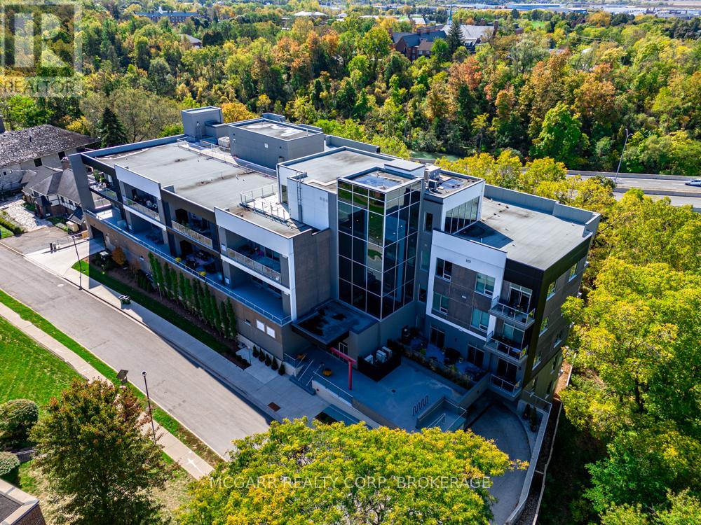 507 - 77 Yates Street, St. Catharines (Downtown), Ontario  L2R 5R7 - Photo 1 - X12938630