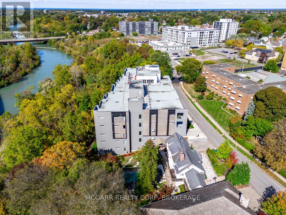 507 - 77 Yates Street, St. Catharines (Downtown), Ontario  L2R 5R7 - Photo 2 - X12938630