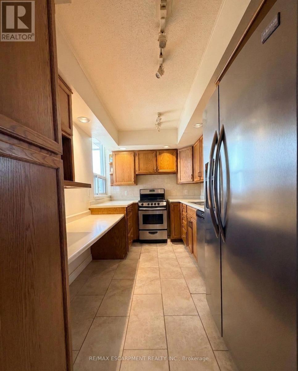 705 - 1415 Ghent Avenue, Burlington, Ontario  L7S 1X4 - Photo 14 - W12938448