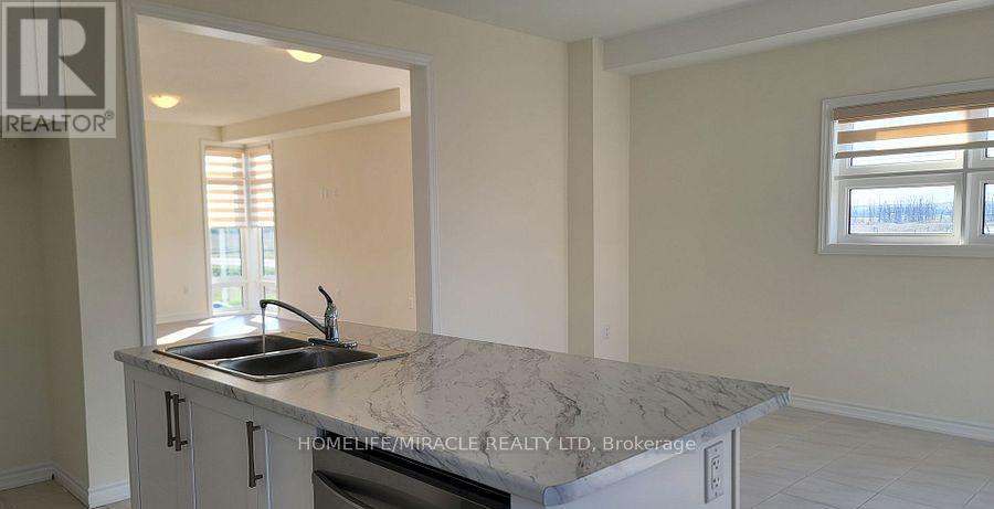 109 Donald Ficht Crescent, Brampton, Ontario  L7A 5H7 - Photo 12 - W12938550