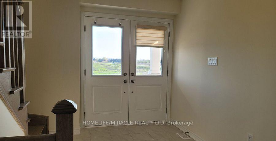 109 Donald Ficht Crescent, Brampton, Ontario  L7A 5H7 - Photo 5 - W12938550