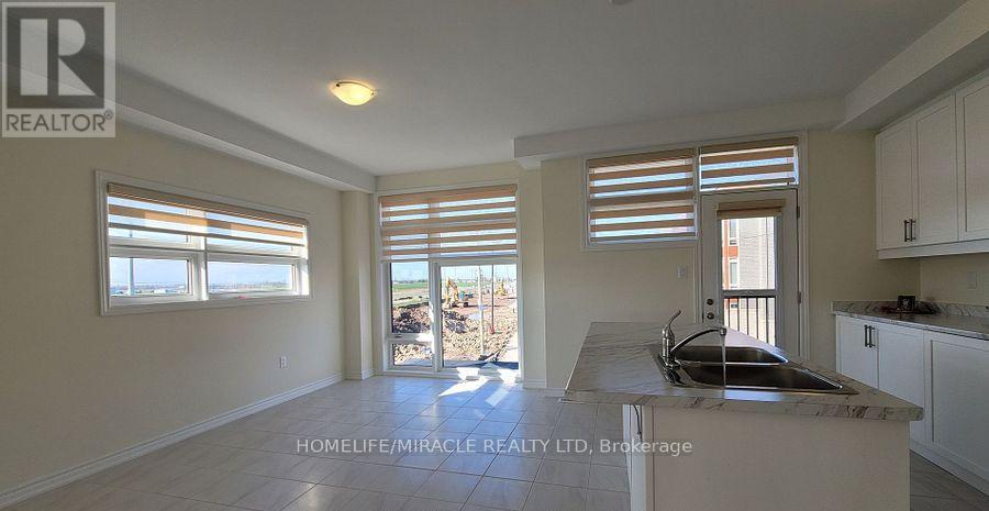 109 Donald Ficht Crescent, Brampton, Ontario  L7A 5H7 - Photo 6 - W12938550