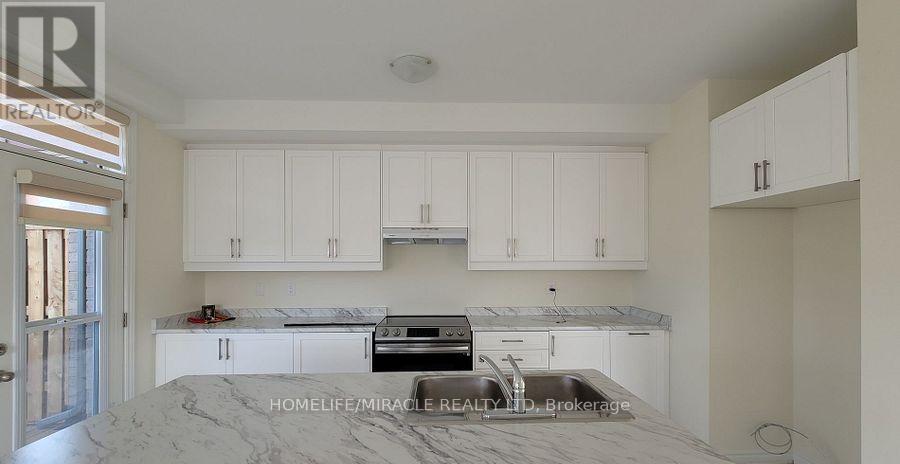 109 Donald Ficht Crescent, Brampton, Ontario  L7A 5H7 - Photo 8 - W12938550