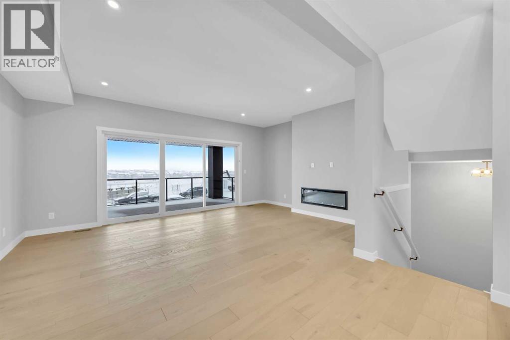 148 Crimson Ridge Place NW, Calgary, Alberta  T3L 0K4 - Photo 4 - A2293407