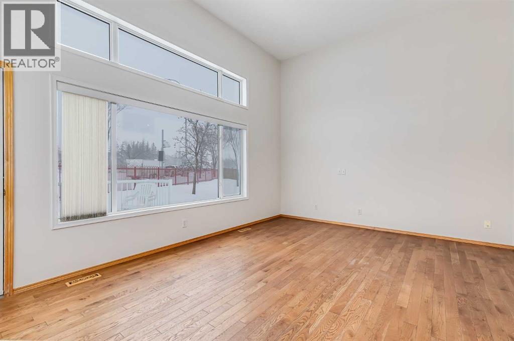 153 Rocky Ridge Court NW, Calgary, Alberta  T3G 4S7 - Photo 5 - A2287379