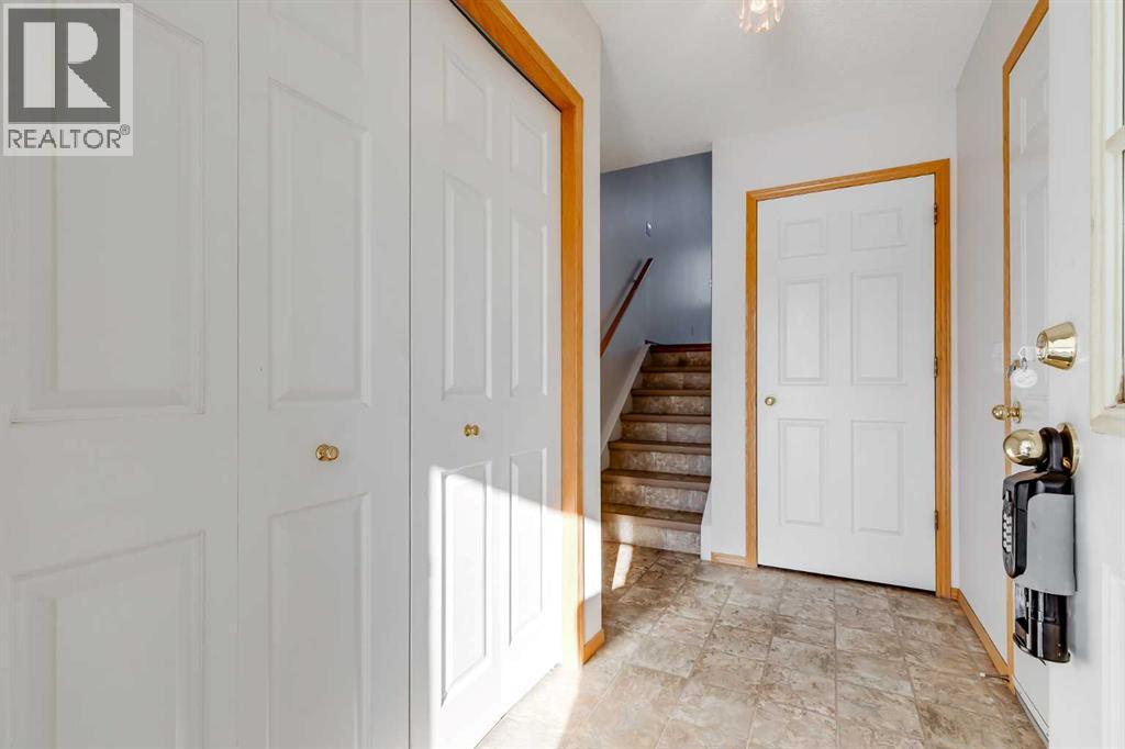 153 Rocky Ridge Court NW, Calgary, Alberta  T3G 4S7 - Photo 3 - A2287379