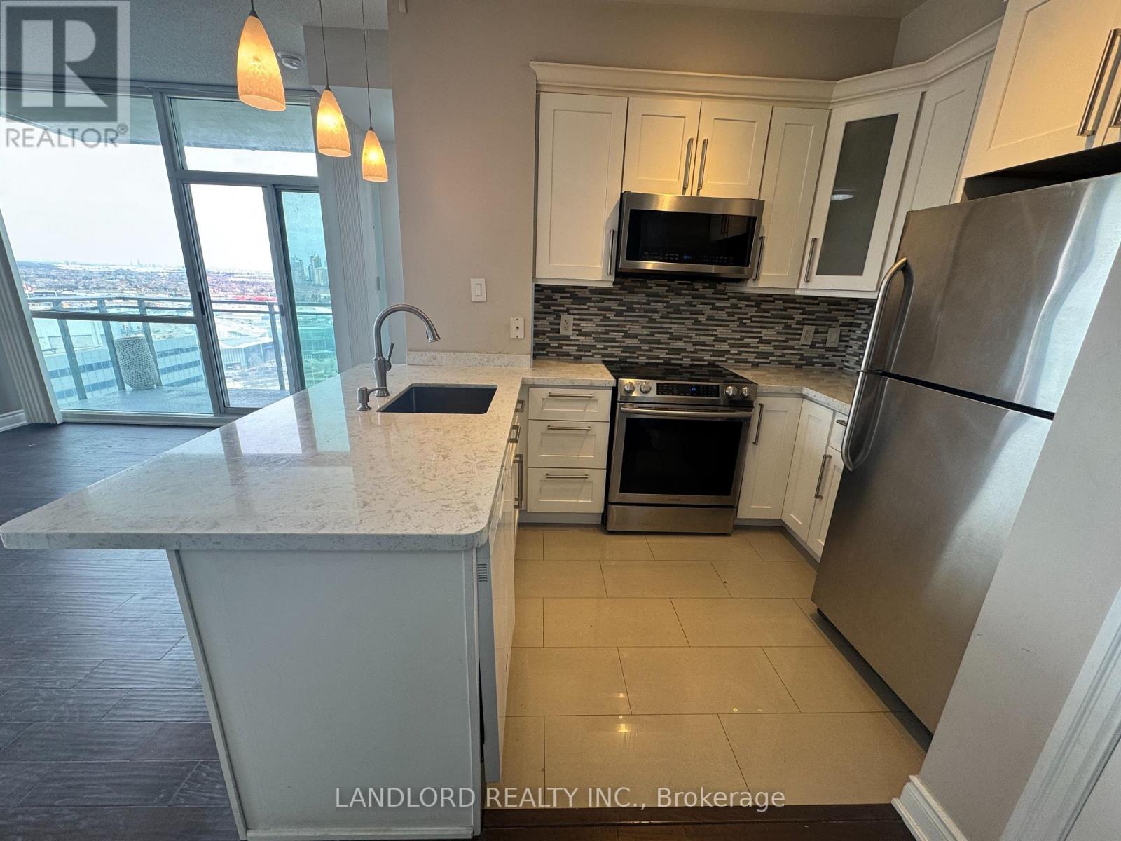 2009 - 220 Burhamthorpe Road W, Mississauga, Ontario  L5B 4N4 - Photo 8 - W12939018