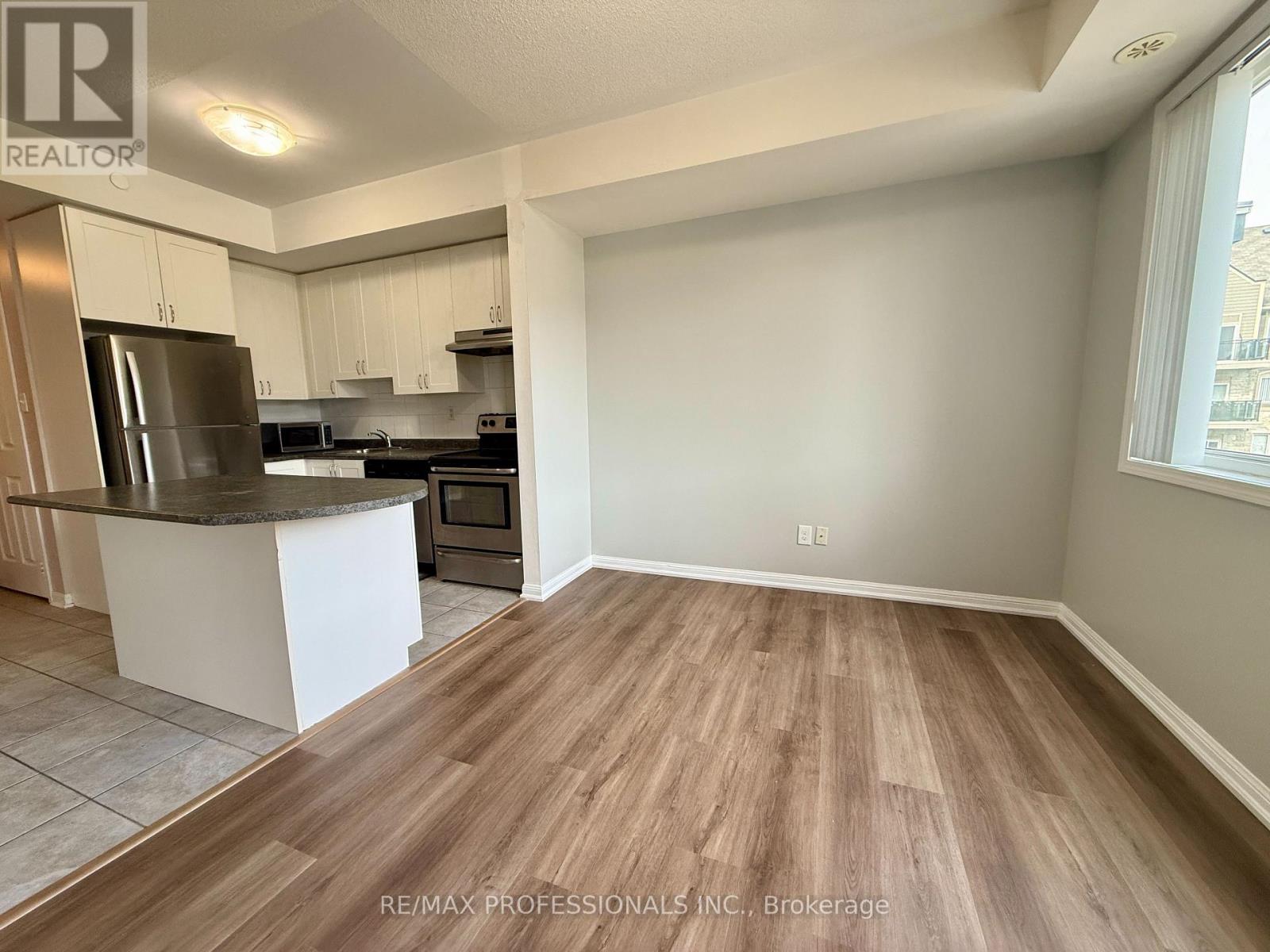 313 - 3075 Thomas Street, Mississauga (Churchill Meadows), Ontario  L5M 0M4 - Photo 3 - W12938350