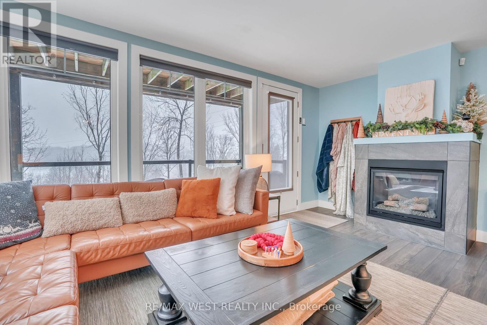 201 - 1 Tree Tops Lane, Huntsville (Chaffey), Ontario  P1H 1A9 - Photo 4 - X12805020