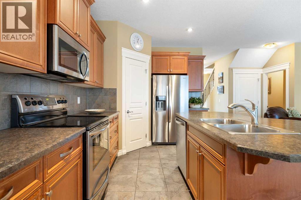 40 Bridleridge Lane SW, Calgary, Alberta  T2Y 5H6 - Photo 16 - A2296367