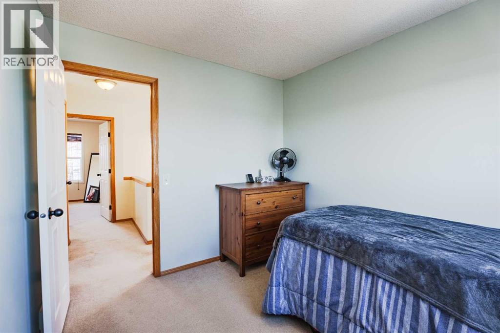 68 Bridleridge Gardens SW, Calgary, Alberta  T2Y 4C9 - Photo 19 - A2287128