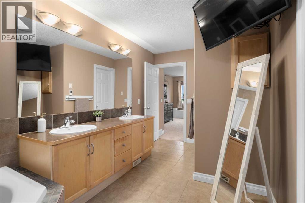173 Cimarron Park Circle, Okotoks, Alberta  T1S 2H5 - Photo 30 - A2295668