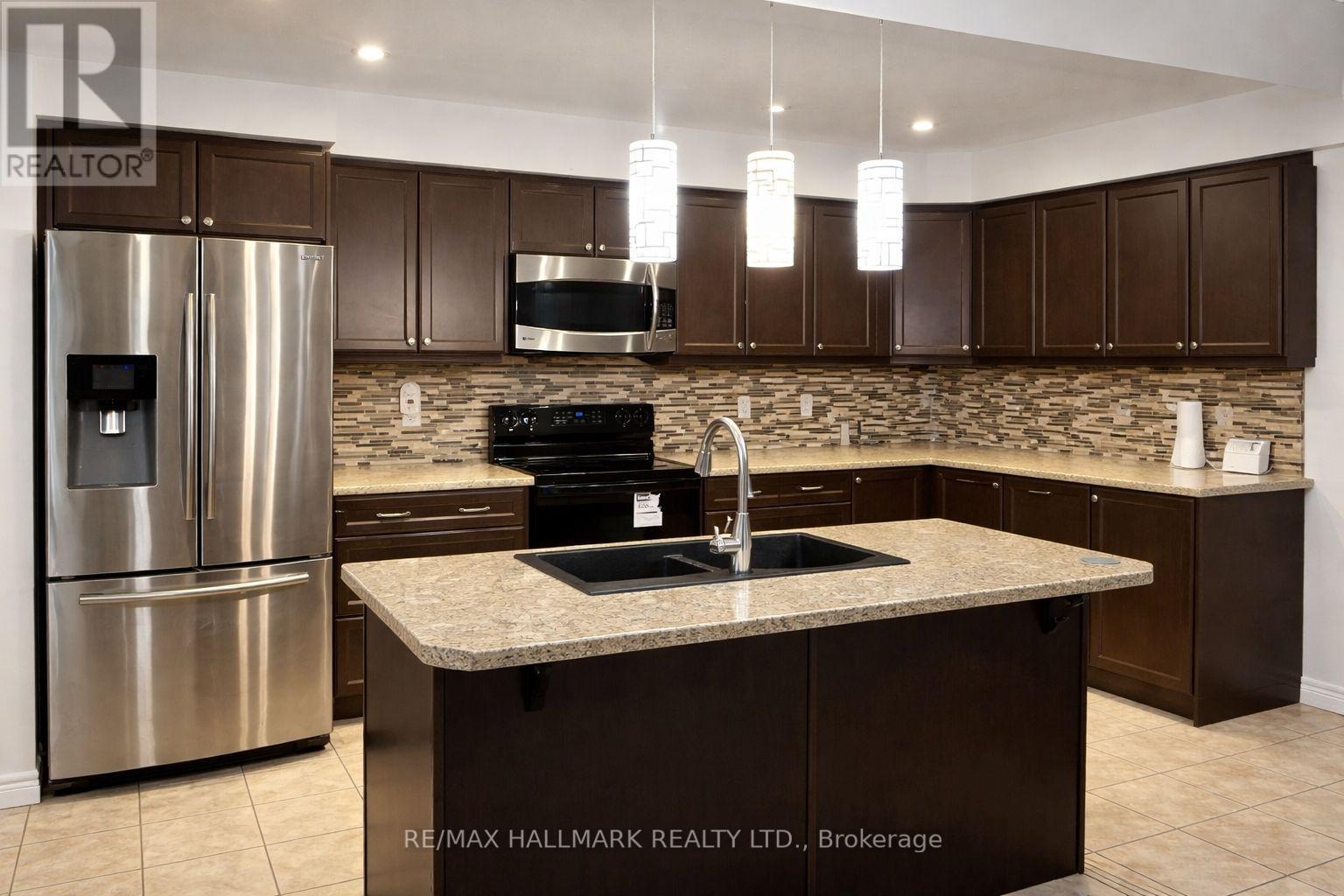 27 Waterbridge Street, Hamilton, Ontario  L8J 0E3 - Photo 5 - X12939768