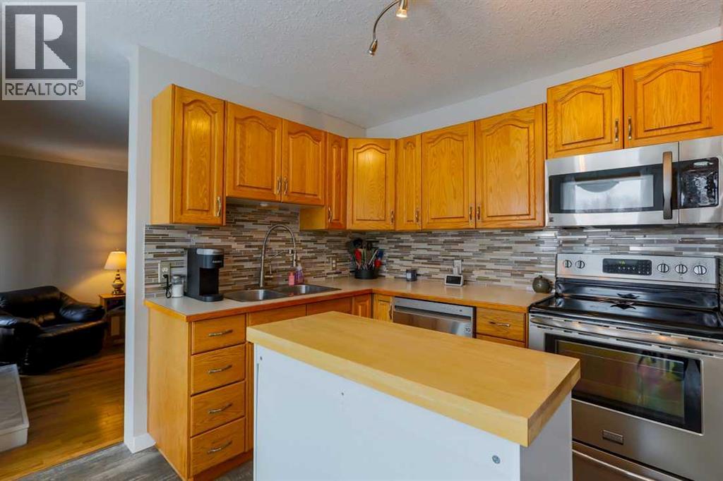 1118 Maple Avenue, Crossfield, Alberta  T0M 0S0 - Photo 11 - A2289574