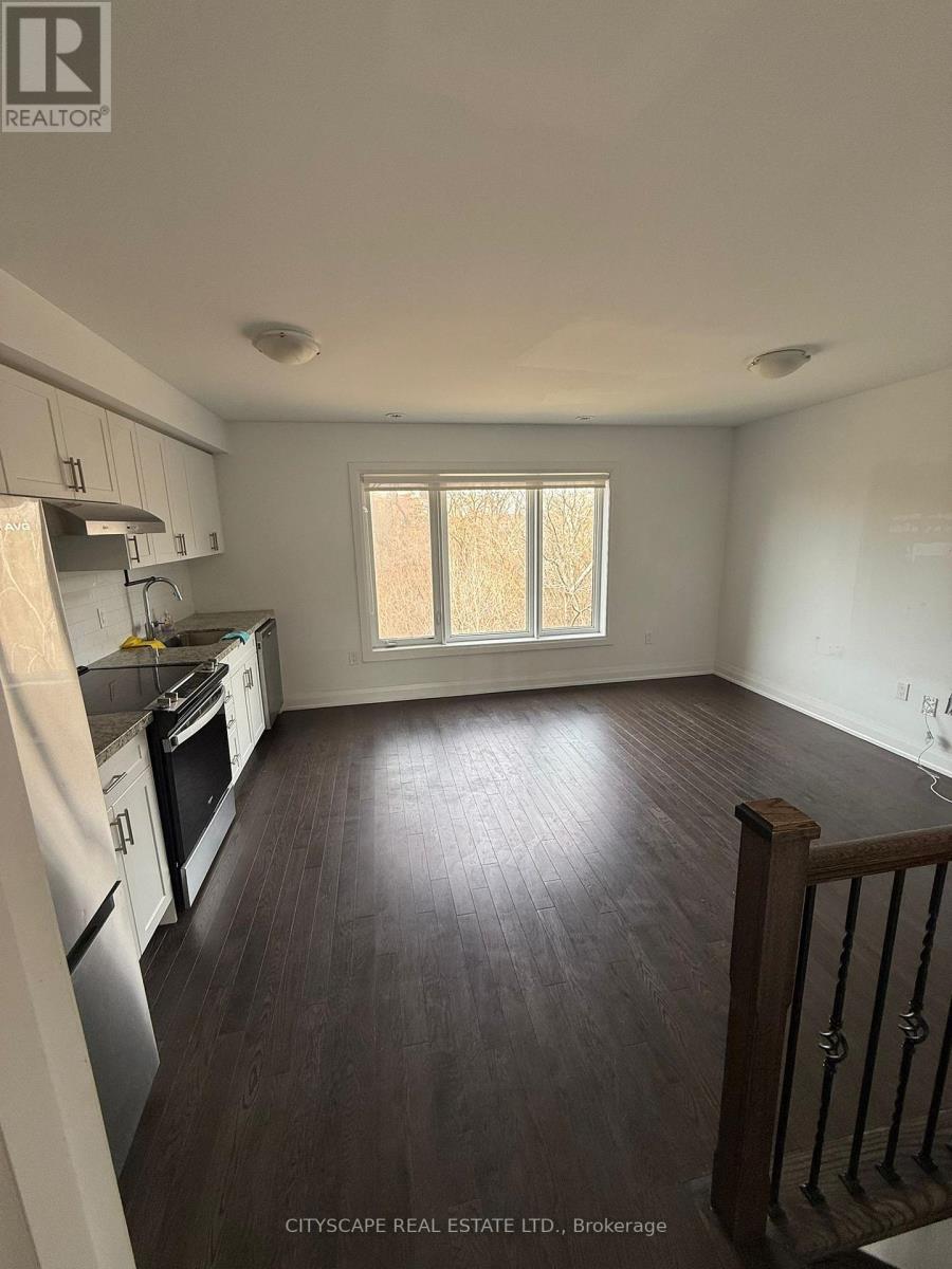 2 - 37 Wild Rose Gardens, Toronto, Ontario  M6L 0A5 - Photo 4 - W12939894