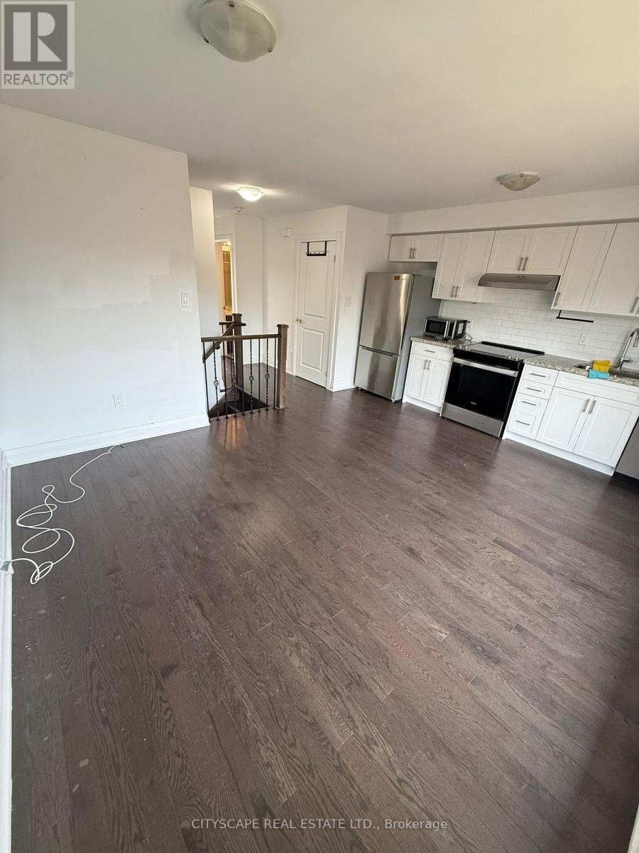 2 - 37 Wild Rose Gardens, Toronto, Ontario  M6L 0A5 - Photo 5 - W12939894