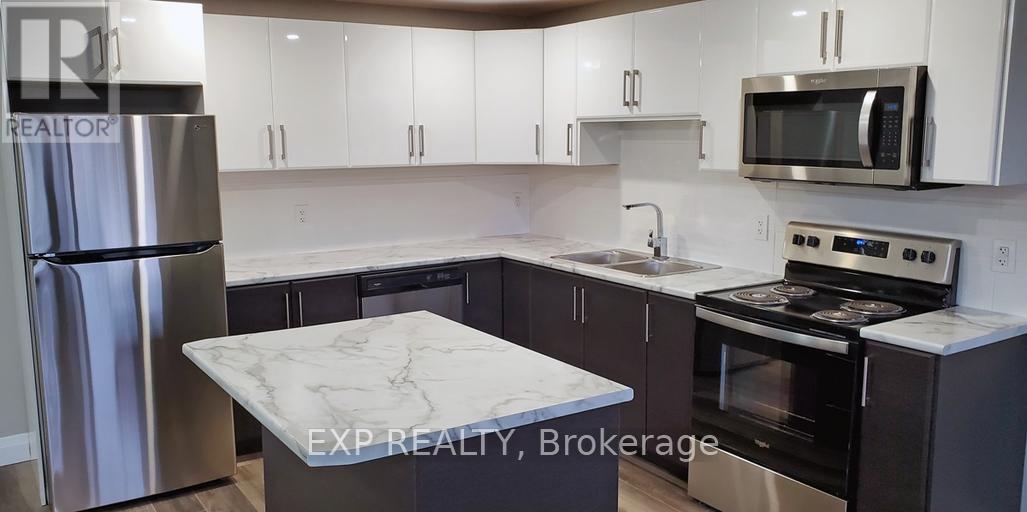 516 - 375 Scott Street, St. Catharines, Ontario  L2M 3W3 - Photo 2 - X12940004