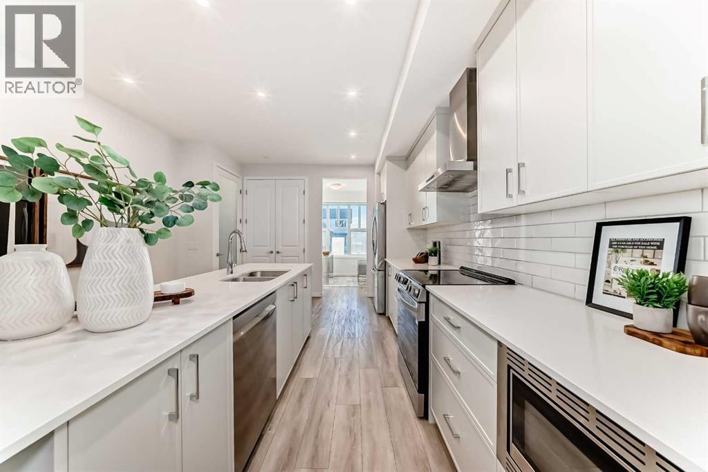 226 Haskayne Drive Nw, Calgary, Alberta T3L 0J7 - Photo 4 - A2291655