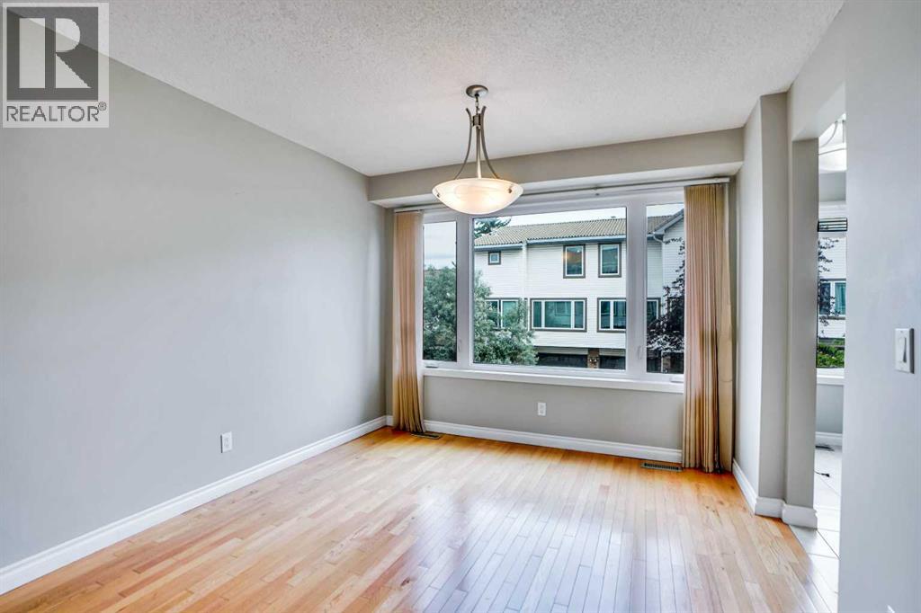 219 Coachway Lane SW, Calgary, Alberta  T3H 1A4 - Photo 5 - A2293775