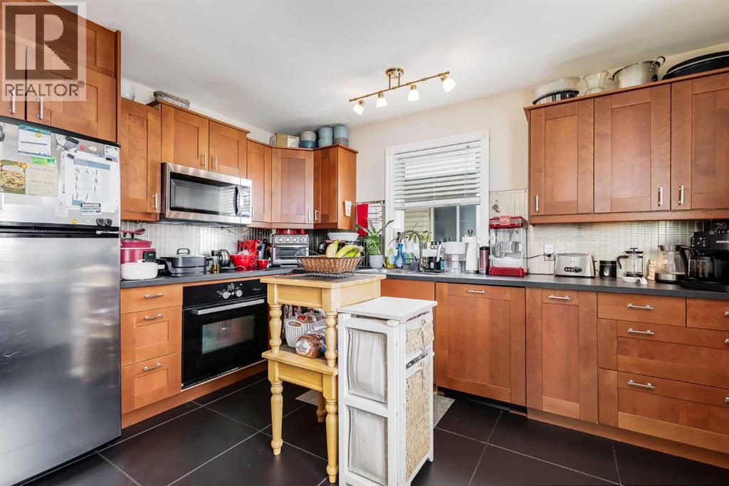 6 West Aarsby Road, Cochrane, Alberta  T4C 1M4 - Photo 4 - A2297276