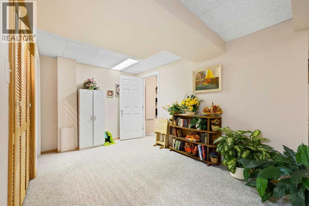 217 Arbour Cliff Close NW, Calgary, Alberta  T3G 3W7 - Photo 28 - A2244003