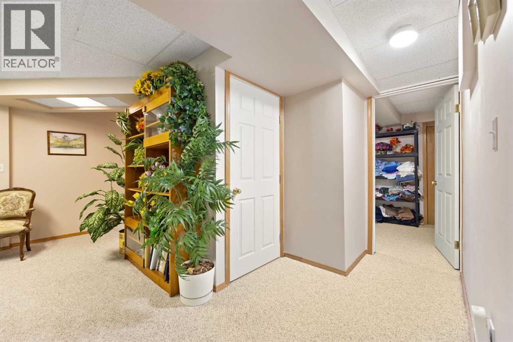 217 Arbour Cliff Close NW, Calgary, Alberta  T3G 3W7 - Photo 29 - A2244003