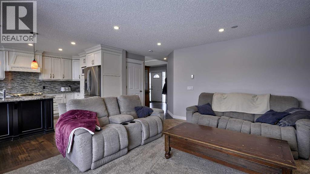 139 Coopers Close Sw, Airdrie, Alberta  T4B 2X1 - Photo 5 - A2297790