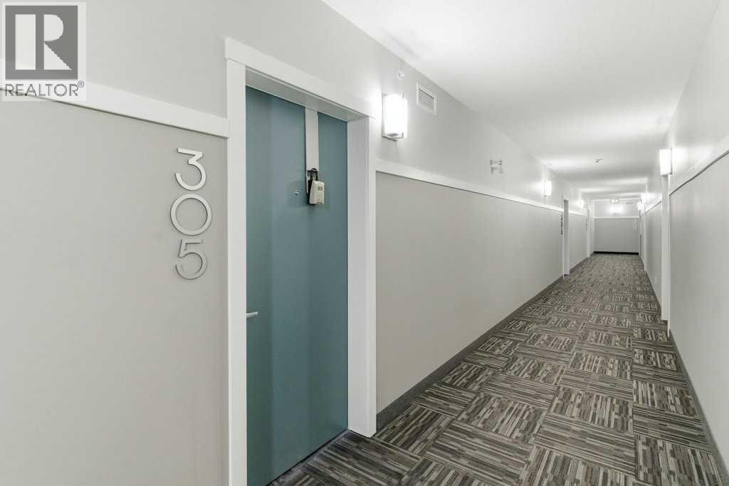 305, 200 Harvest Hills Place NE, Calgary, Alberta  T2M 0C8 - Photo 4 - A2283997