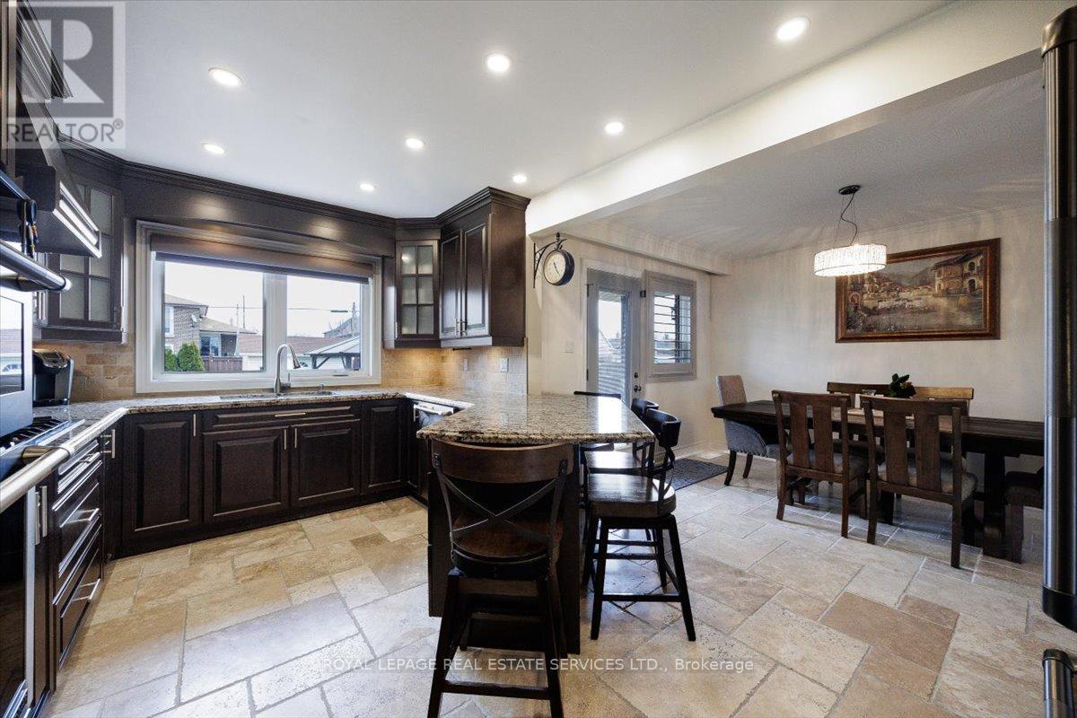 91 Macleod Street, Toronto, Ontario  M6L 2M8 - Photo 17 - W12939706