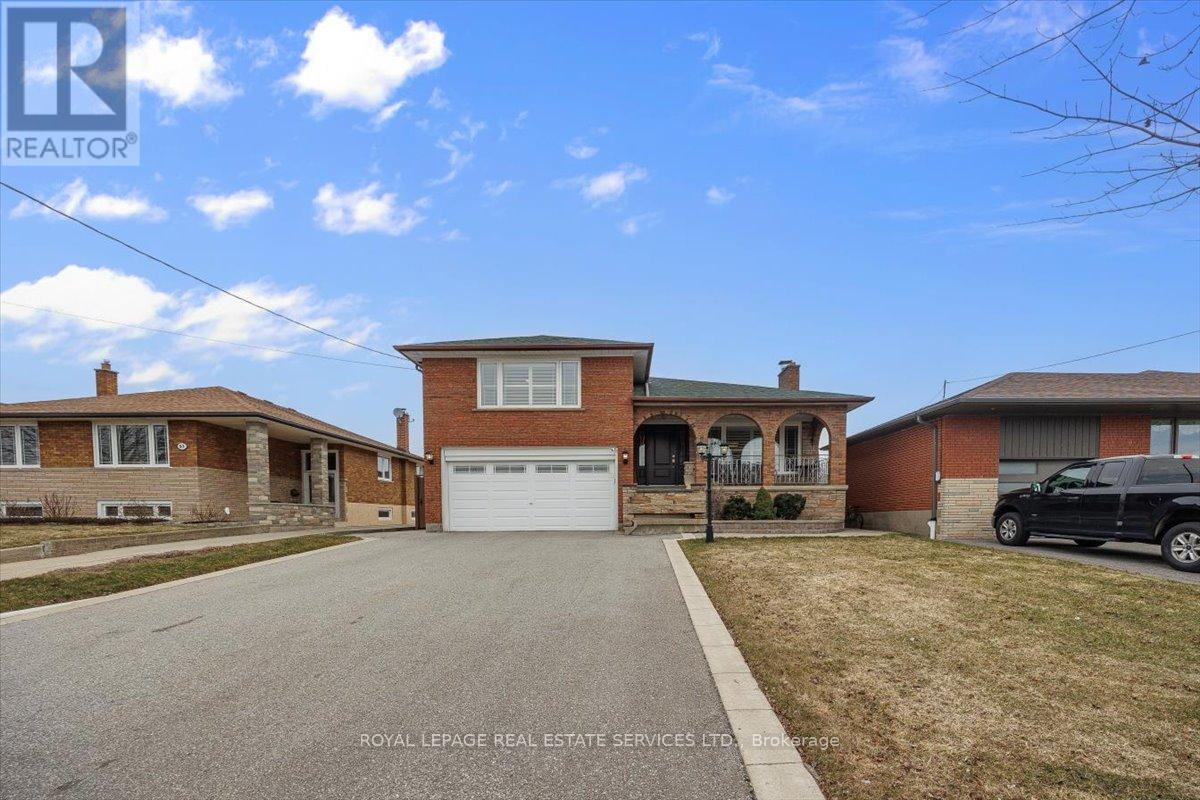 91 Macleod Street, Toronto, Ontario  M6L 2M8 - Photo 5 - W12939706